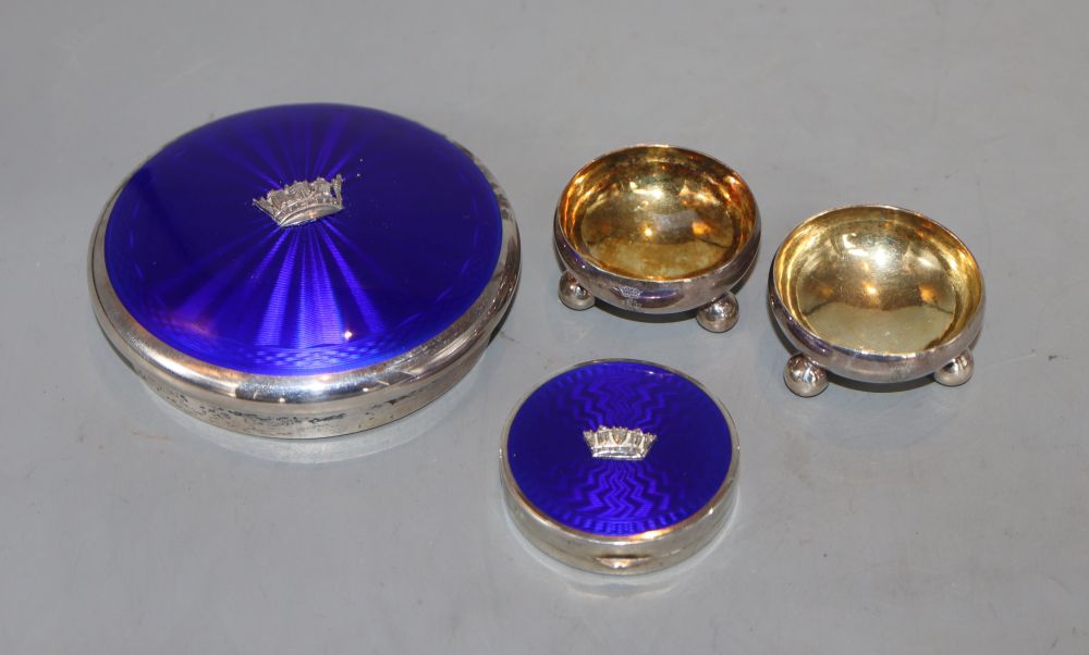 A pair of early 20th century Russian white metal salts, 46mm, a 1920s silver and enamel patch box and matching powder jar lid.